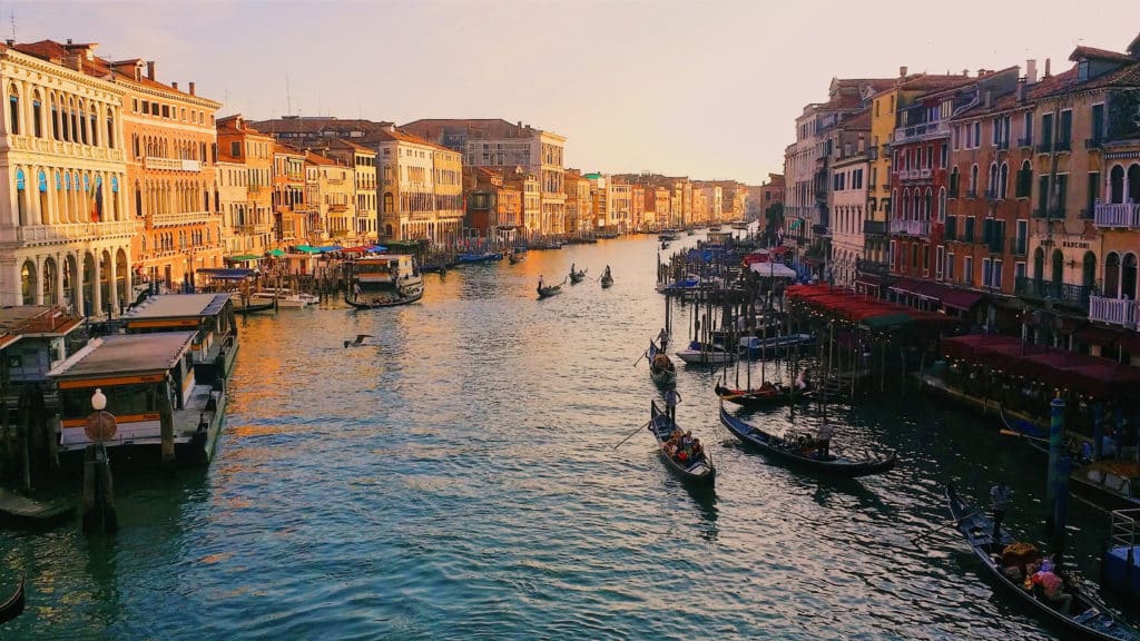 A colorful image of Venice Grand Canal implying a destination wedding location