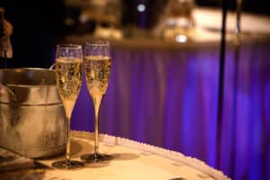 Champagne Glass implying Tipping Vendors from Michelle and Matthew Gauthier Wedding at Wintergreen Woods in Lexington South Carolina