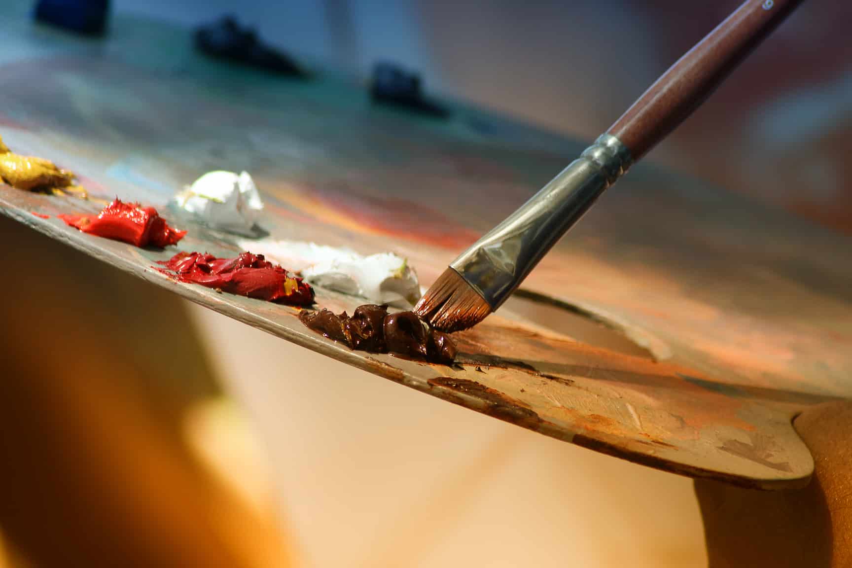Shallow-Focus-Photography-of-Paintbrush-Implying-Live-Painter-and-Live-Painting-at-weddings