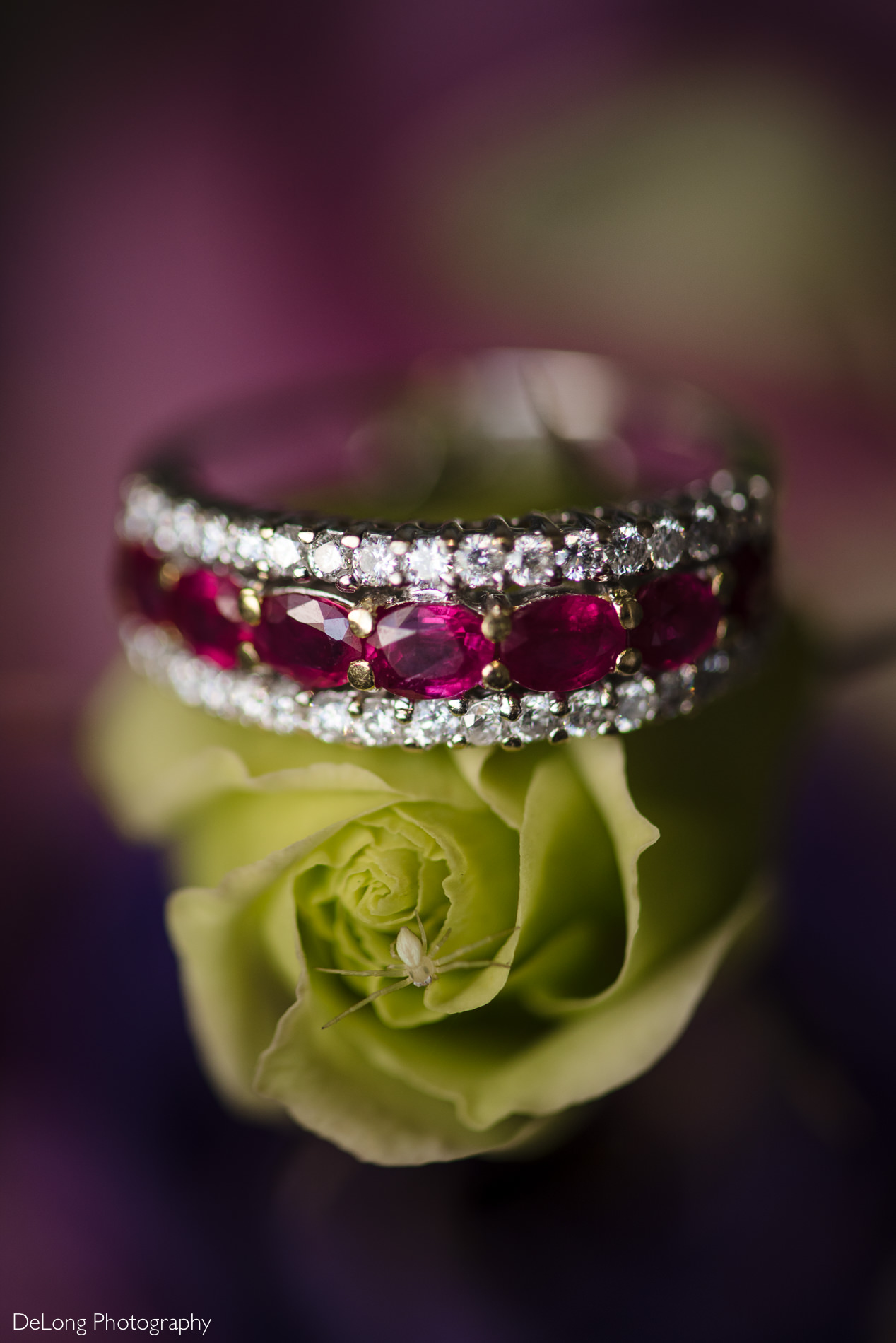 Bride's ruby and diamond ring in her bouquet detail photo by Charlotte wedding photographers DeLong Photography