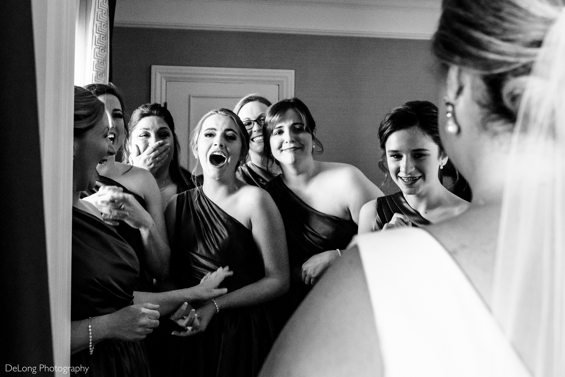 Bridemaids surprised and gasping reactions to bridesmaid reveal by Charlotte Wedding Photographers DeLong Photography