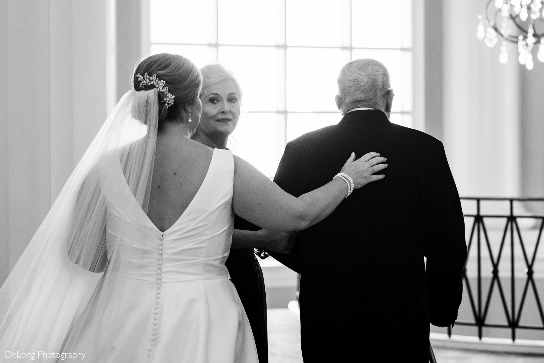First look with bride's parents at the Ballantyne Hotel by Charlotte Wedding Photographers DeLong Photography