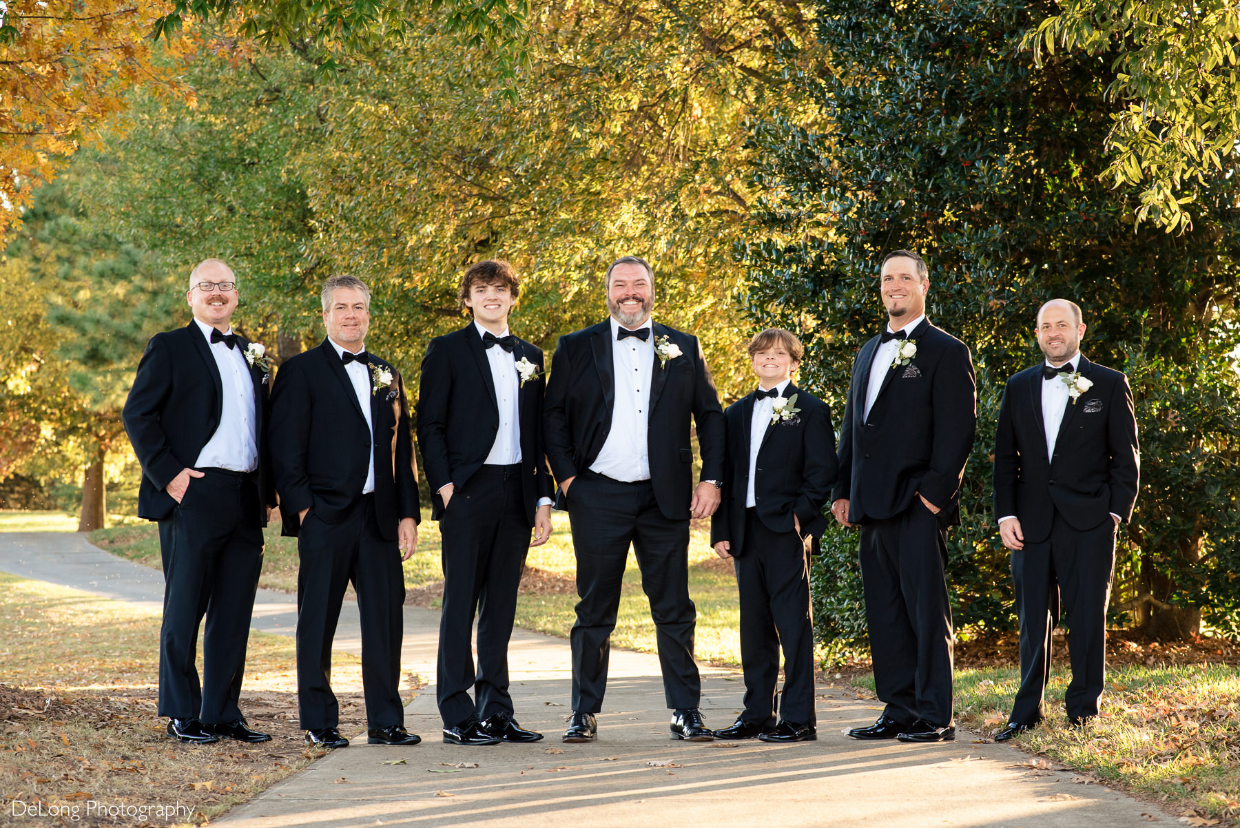Groom with groomsmen portrait at the Club at Longview by Charlotte Wedding Photographers DeLong Photography