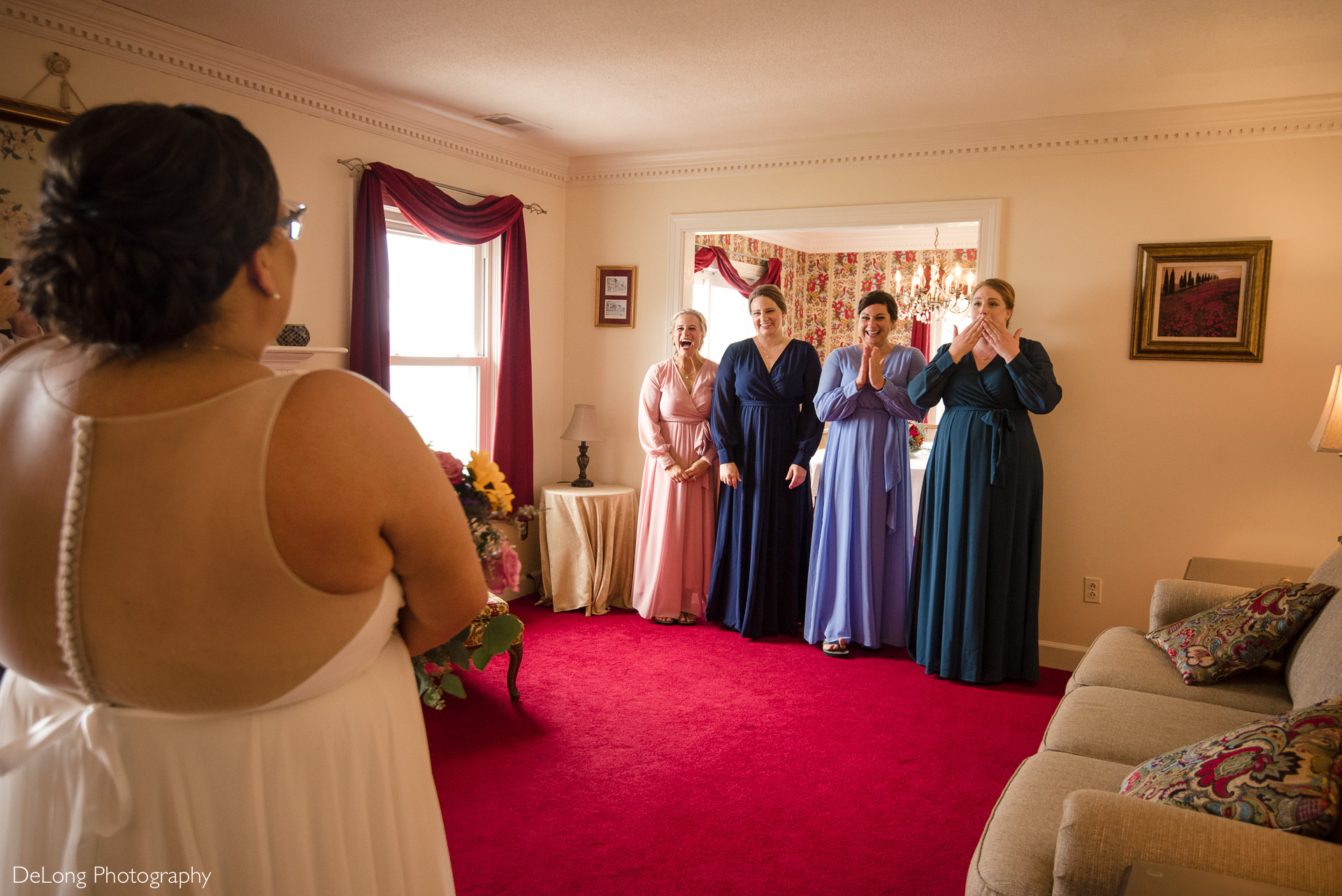 Bridesmaids reaction to bridemaid's reveal at the Island House by Charlotte Wedding Photographers DeLong Photography