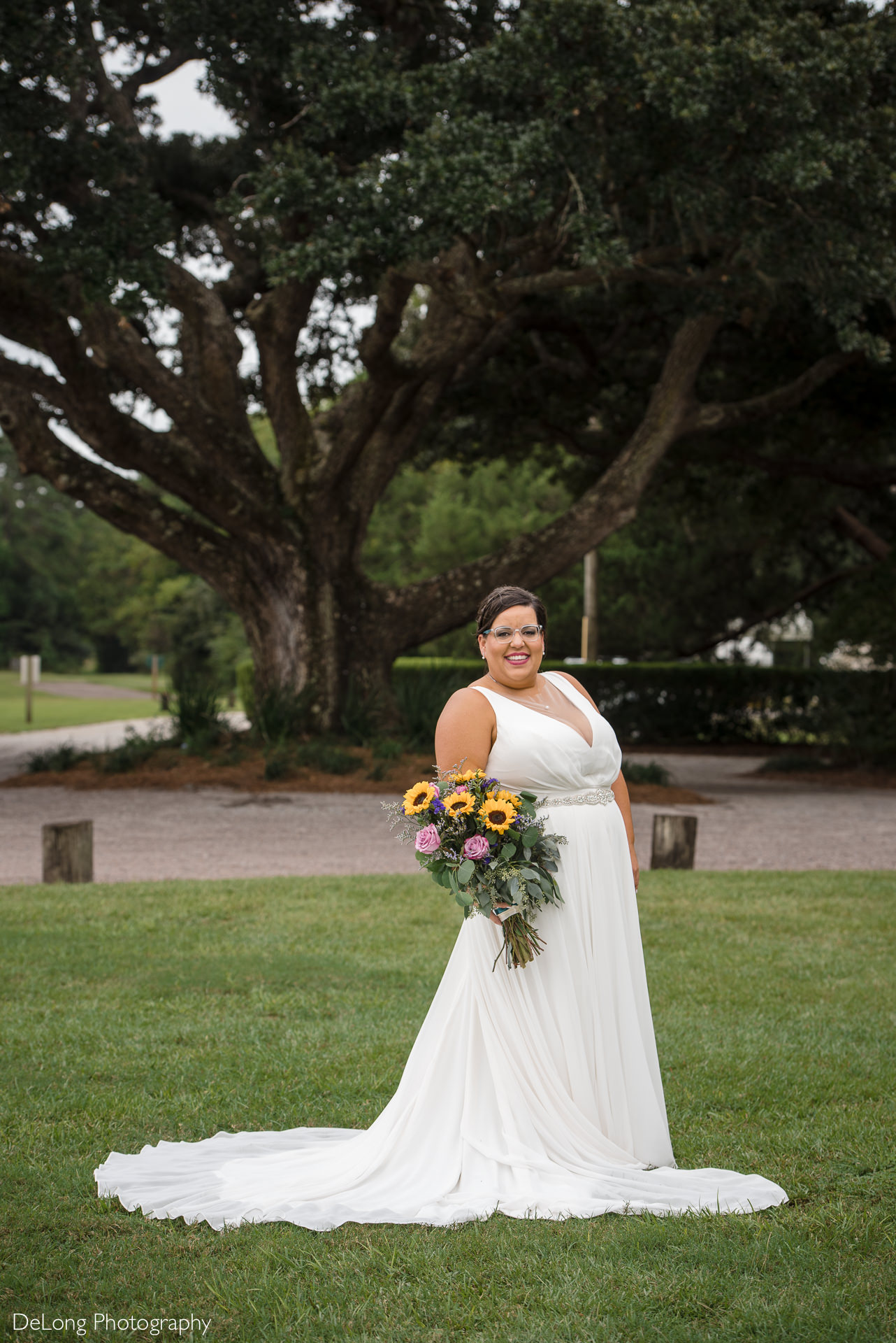 Bridal portrait on the lawn at the Island House in Charleston, SC by Charlotte Wedding Photographers DeLong Photography