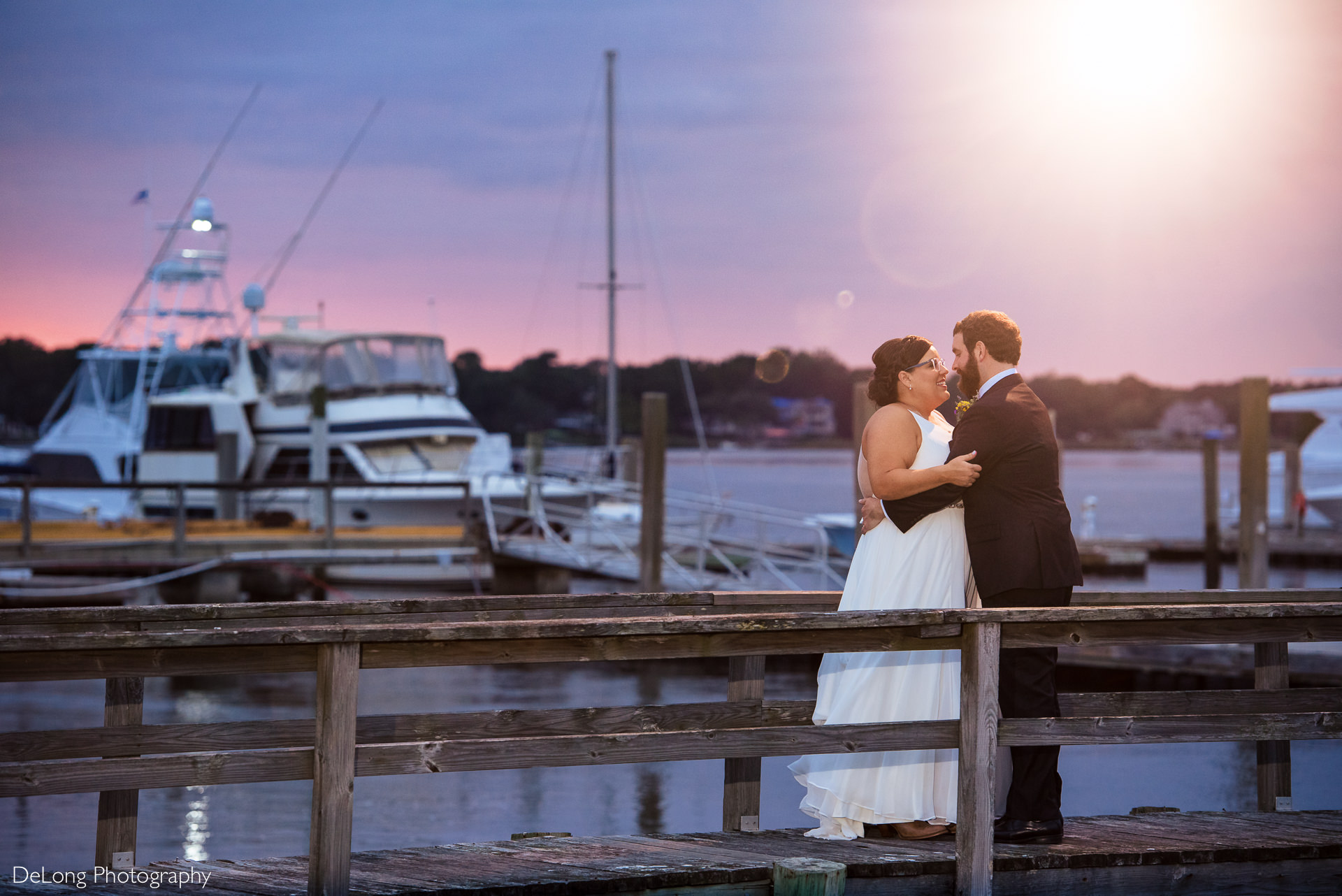Sunset bride and groom portrait at the Island House in Charleston, SC by Charlotte Wedding Photographers DeLong Photography