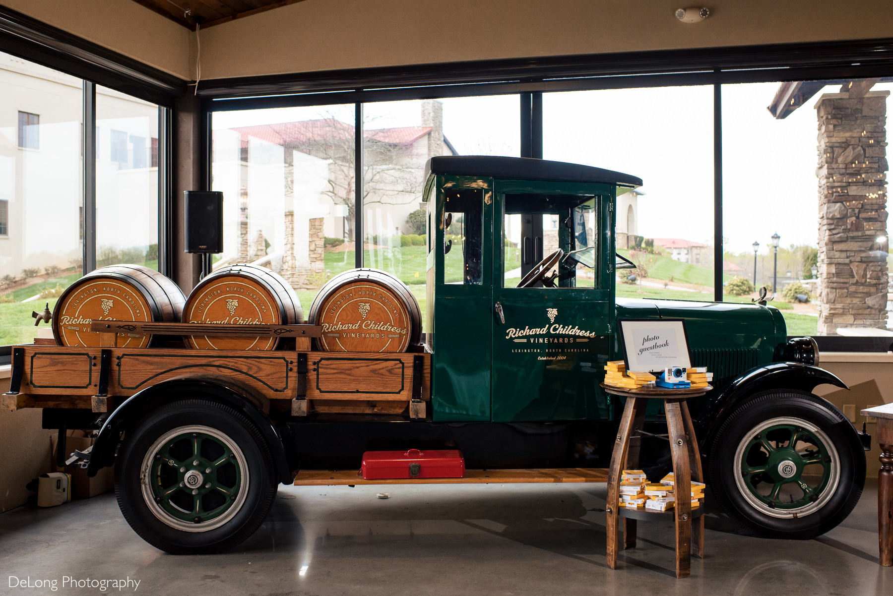 Winery truck inside reception space used as a photo booth at Childress Vineyards by Charlotte Wedding Photographers DeLong Photography