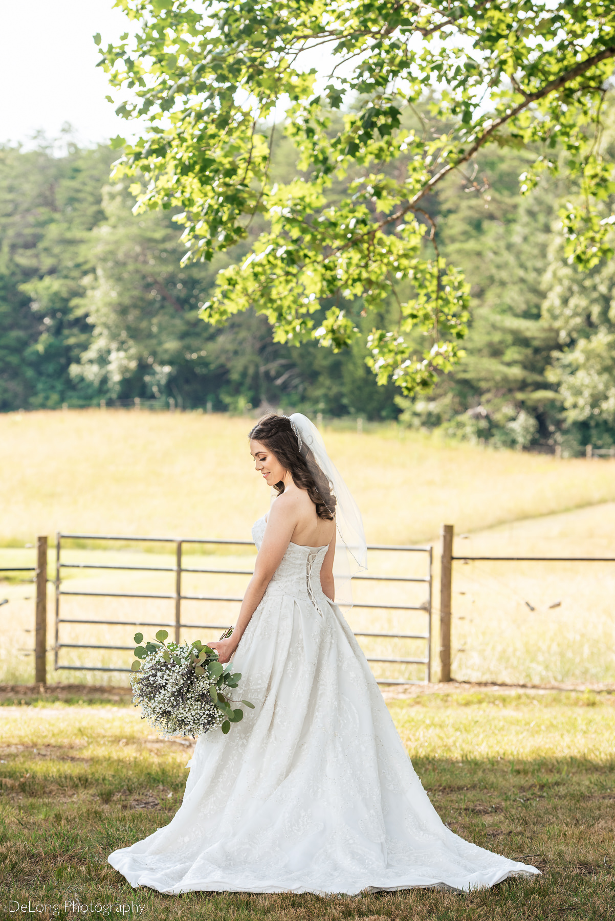 Outdoor bridal portrait of bride at Lady Bird Farms by Charlotte Wedding Photographers DeLong Photography