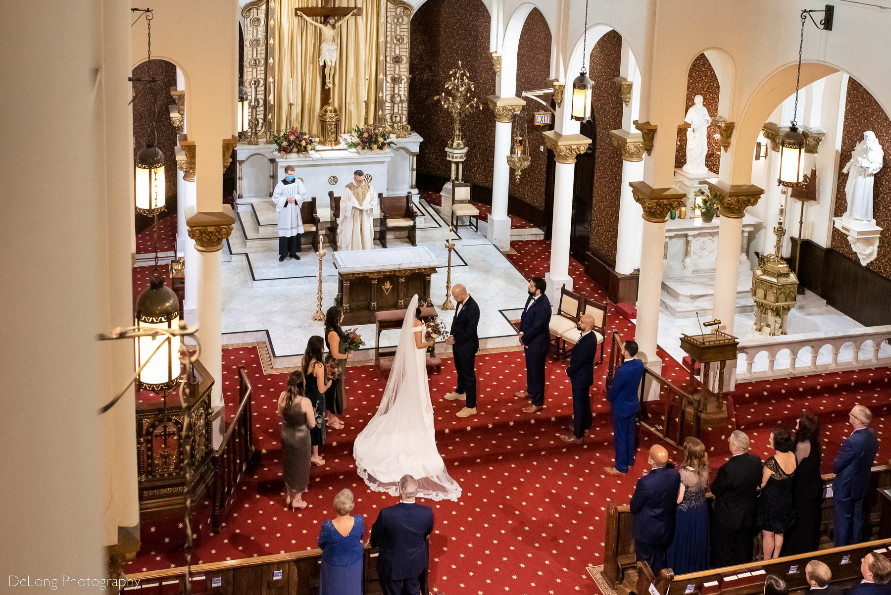 Balcony view of a wedding ceremony at the Basilica of the Sacred Heart of Jesus in Atlanta, GA by Charlotte wedding photographers DeLong Photography 
