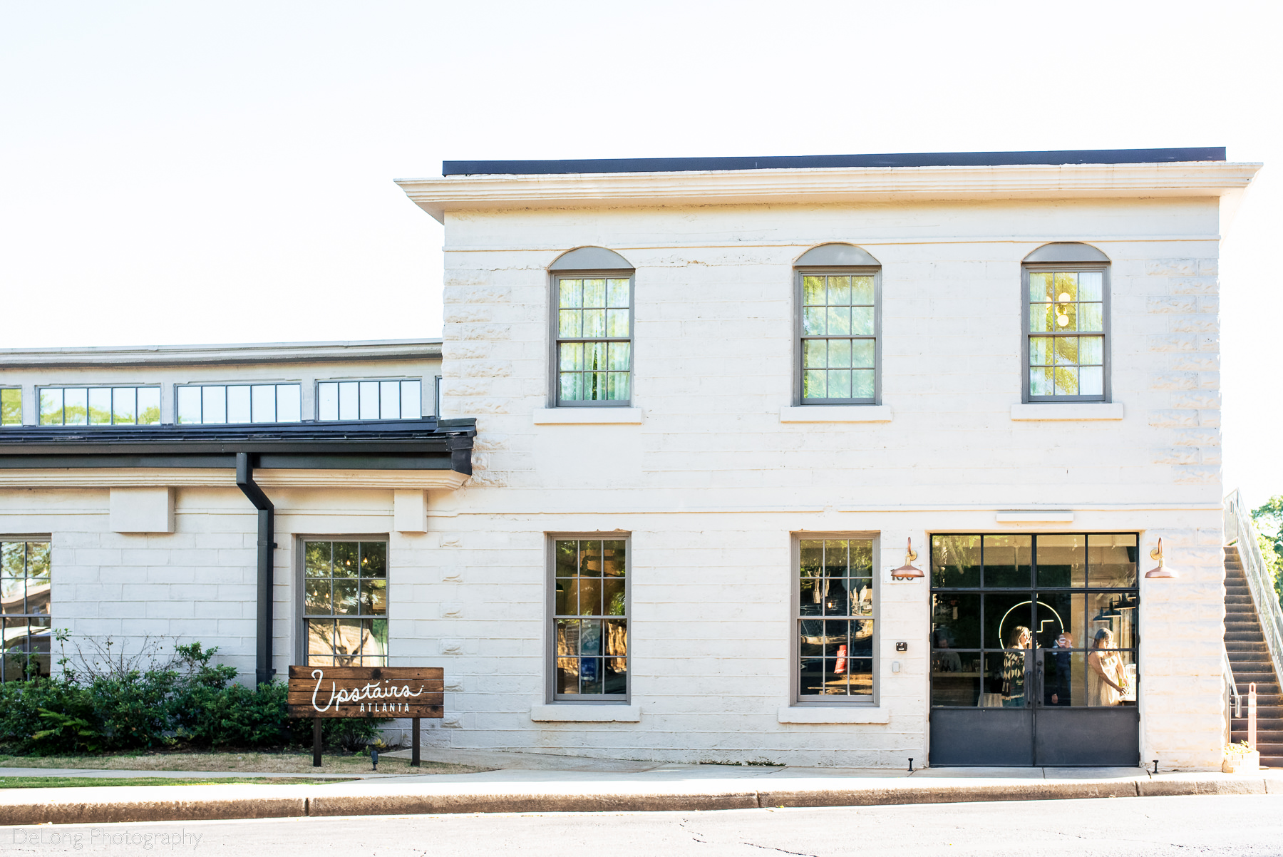 Outdoor wedding venue photograph of Upstairs Atlanta in Atlanta, Georgia. Photograph by Charlotte wedding photographers DeLong Photography.