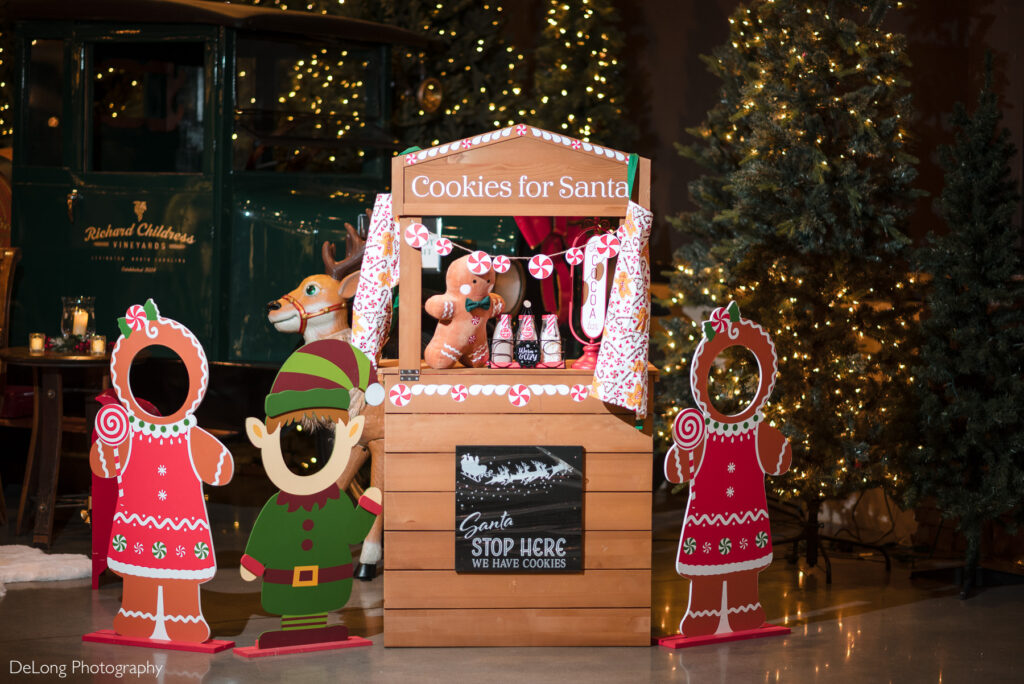 Festive holiday décor display featuring a “Cookies for Santa” stand inside Childress Vineyards in Lexington, North Carolina, photographed as part of a Childress Vineyards wedding celebration.